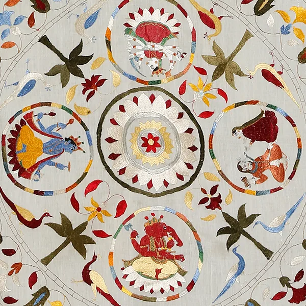 A Chamba Rumal embroidered cloth, figurative deity scenes in circular medallions around a central lotus in fine satin stitch.