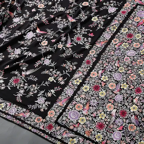 Parsi Gara embroidery, a full shawl on a black ground worked with floral and bird motifs.