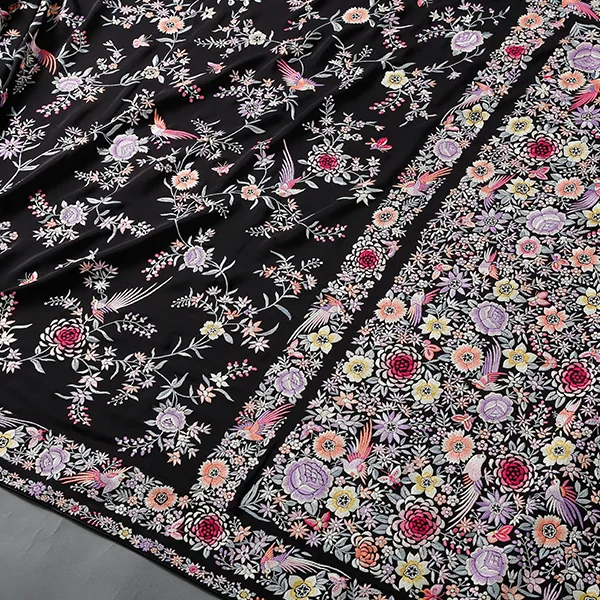 Parsi Gara embroidery, a full shawl on a black ground worked with floral and bird motifs.